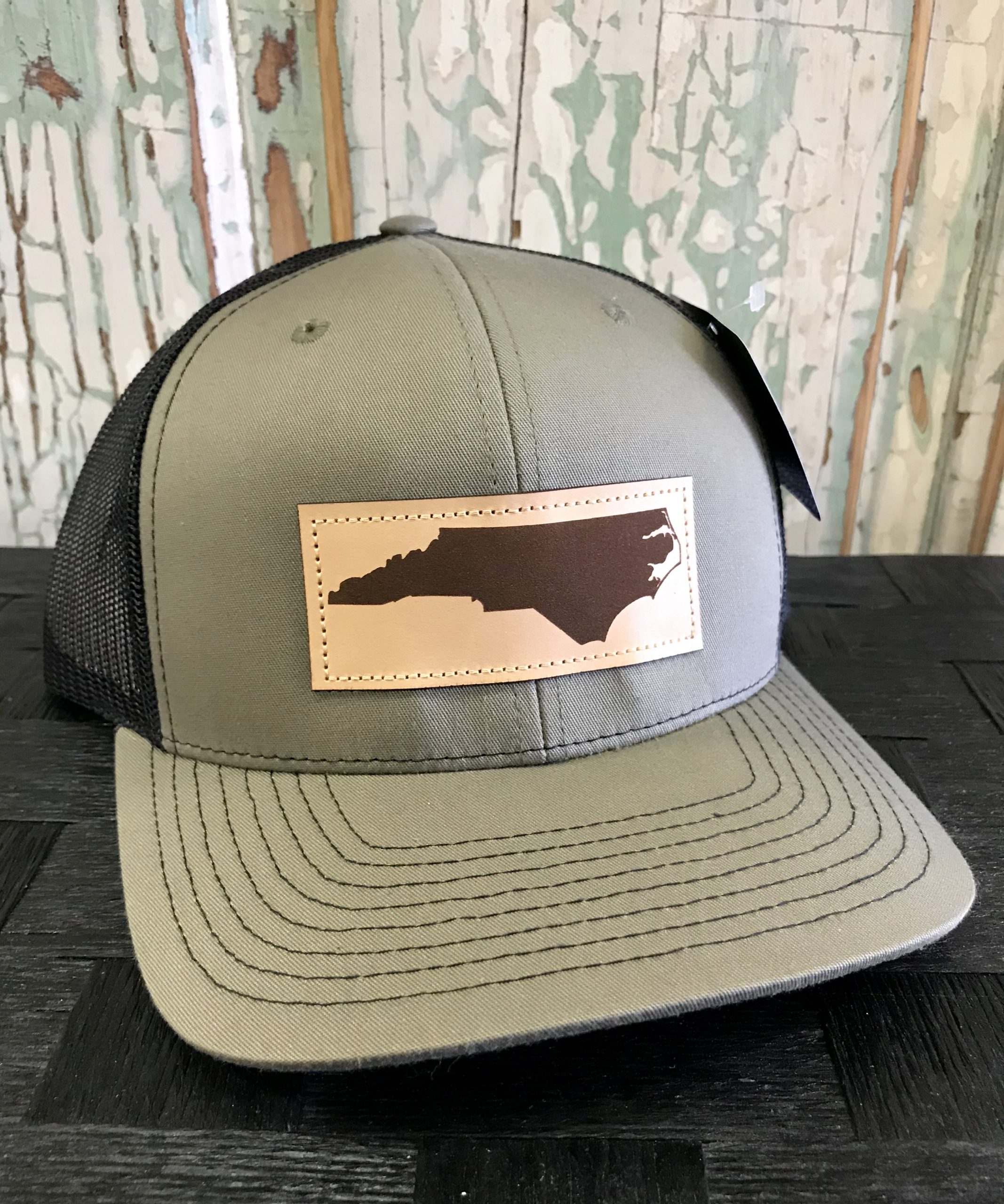 nc leather patch trucker hat